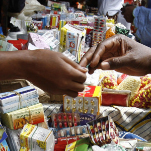 Shoppers buy smuggled counterfeit drugs at the Adjame market in Abidjan, Ivory Coast, in 2007.