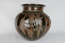 Hand-built pot by Ladi Kwali with incised figures; W.A. Ismay Studio Ceramics Collection, York Art Gallery